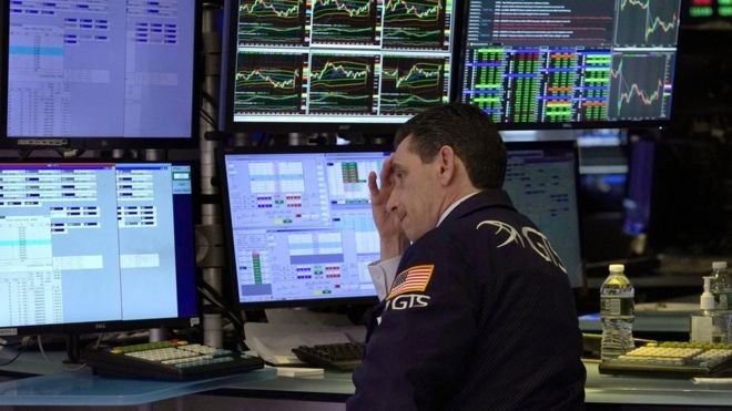 Stock markets plunge as virus becomes a pandemic